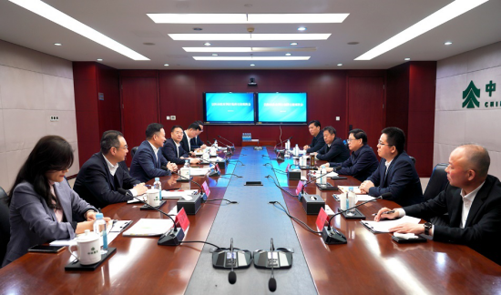 余红辉会见河南省信阳市委副书记、市长陈志伟一行